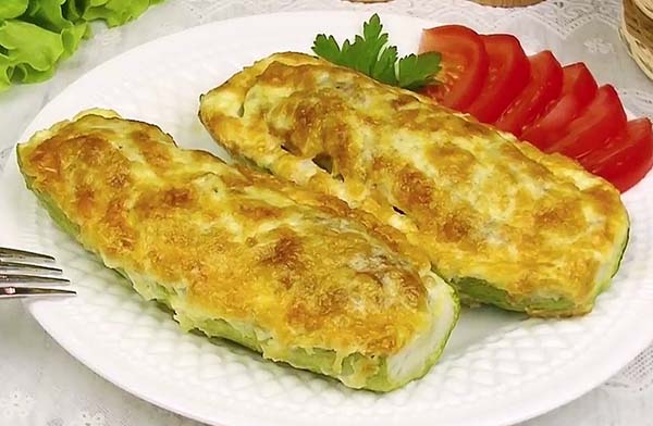 Кабачки с фаршем и рисом под сыром